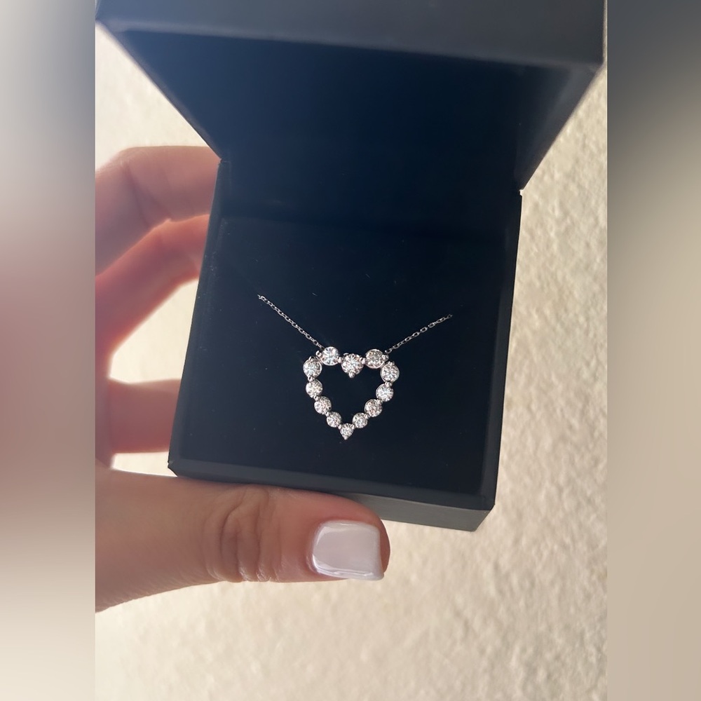 Diamond white gold heart necklace.
